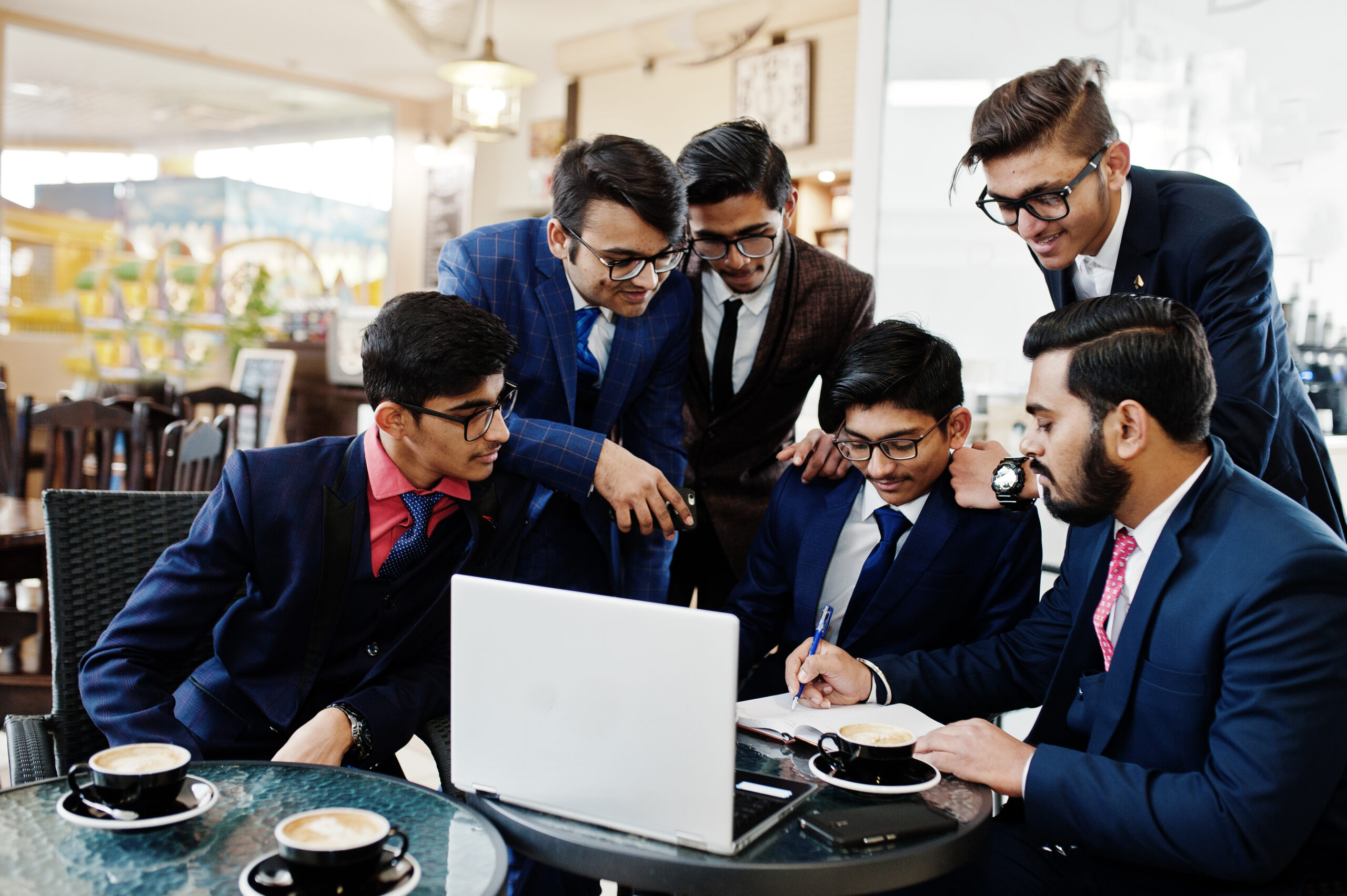 http://eithm.org/wp-content/uploads/2026/04/collaborative-process-indian-business-mans-brainstorming-meeting-officediverse-team-young-people-dressed-suits-cooperating-developing-common-project-scaled.jpg